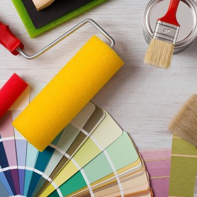 image of general decorating tools and colour chart to represent the category of painting and decorating jobs