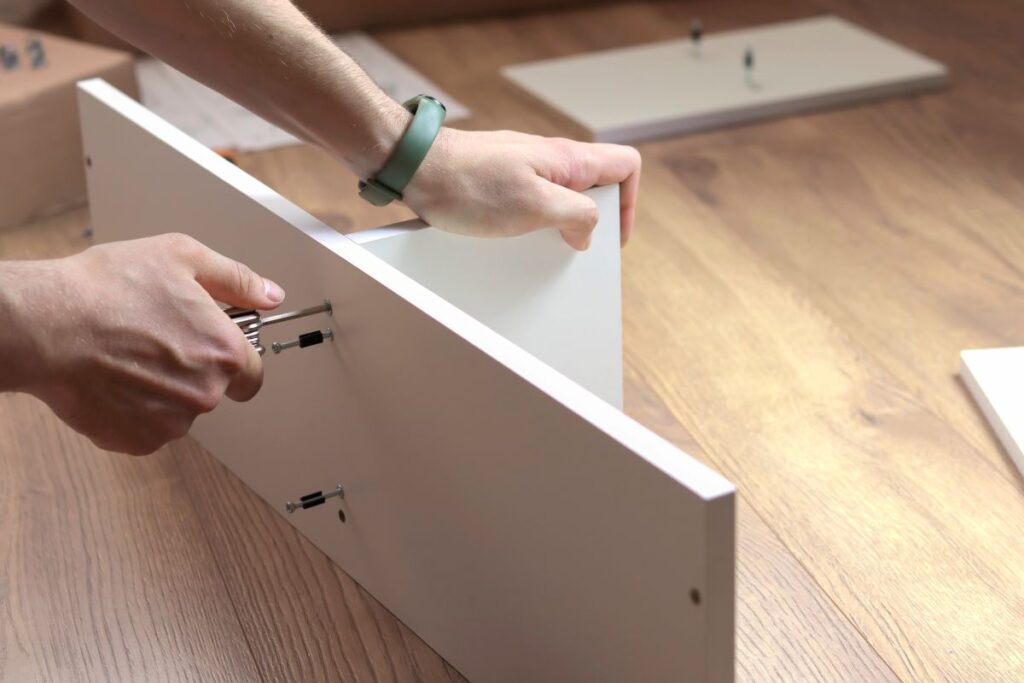 image of a flat pack shelf being assembled